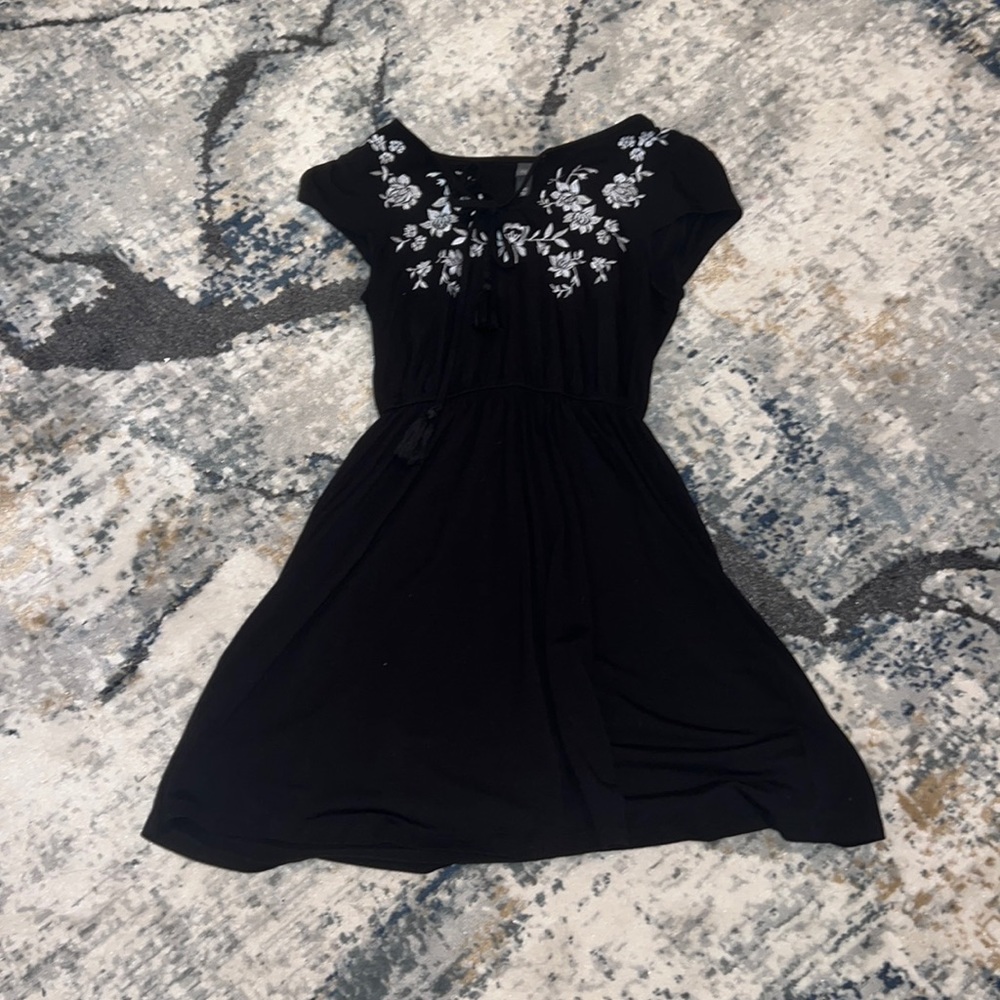 A black with white flower detail dress